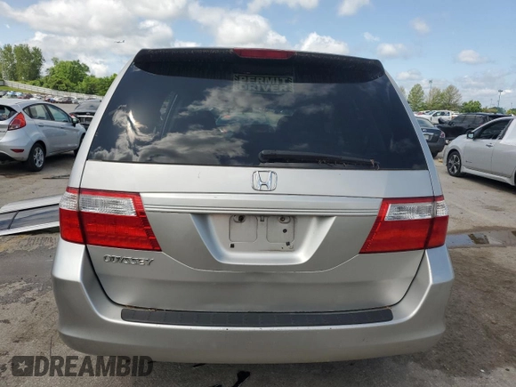 2007 Honda Odyssey LX z VIN 5FNRL382X7B084104, wystawiony jako Copart lot #57399625 z przebiegiem 213 134 mil mil oraz Szkoda całkowita • Salvage title. Historia ofert i sprzedaży dostępna na DreamBid. Obrazek 6.