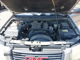 2002 GMC Envoy SLT with VIN 1GKDS13S422446808, listed as a IAAI auction lot 41896943 with 271,771 mi miles. Bid and sale history available at carsss.com. Image 10.