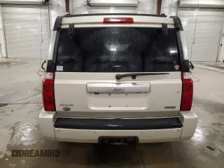 2007 Jeep Commander Overland z VIN 1J8HG68237C610869, wystawiony jako Copart lot #59824675 z przebiegiem 229 092 mil mil oraz Szkoda całkowita • Salvage title. Historia ofert i sprzedaży dostępna na DreamBid. Obrazek 6.