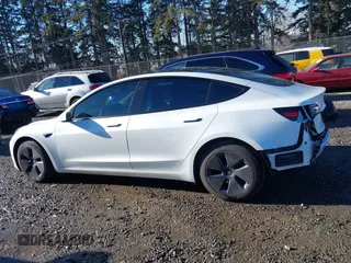 2023 Tesla Model 3 z VIN 5YJ3E1EA0PF611244, wystawiony jako IAAI lot #41455102 z przebiegiem 21 867 mil mil oraz . Historia ofert i sprzedaży dostępna na DreamBid. Obrazek 15.
