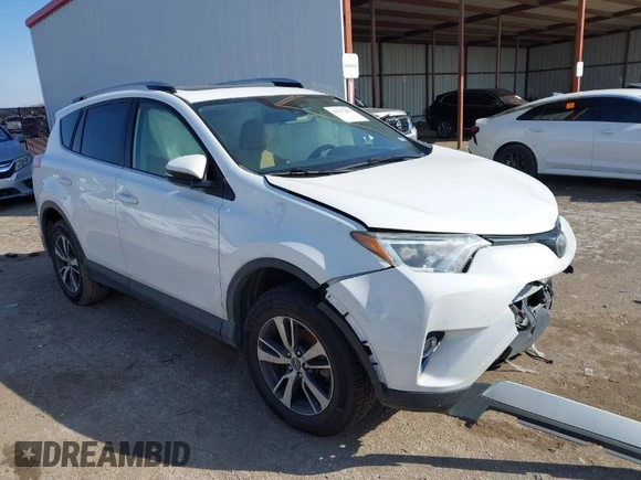 2018 Toyota RAV4 XLE with VIN JTMWFREV7JJ728184, listed as a IAAI auction lot 41377413 with 117,957 mi miles. Bid and sale history available at carsss.com. Image 1.