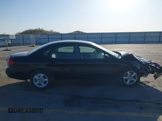 2002 Ford Taurus SE Standard with VIN 1FAFP53U72G132285, listed as a IAAI auction lot 41965332 with 214,966 mi miles and . Bid and sale history available at DreamBid. Image 14.
