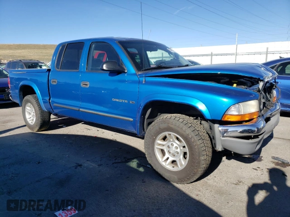 2001 Dodge Dakota Sport with VIN 1B7GG2AN71S112316, listed as a Copart auction lot 50463975 with 216,413 mi miles and Salvage Title. Bid and sale history available at carsss.com. Image 4.