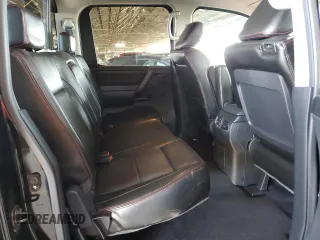 2011 Nissan Titan Pro-4X z VIN 1N6BA0EC9BN304469, wystawiony jako Copart lot #52982815 z przebiegiem 108 829 mil mil oraz Szkoda całkowita • Salvage title. Historia ofert i sprzedaży dostępna na DreamBid. Obrazek 10.