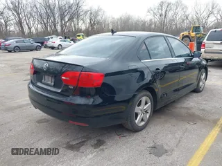 2012 Volkswagen Jetta TDI w/Premium with VIN 3VWLL7AJ9CM367840, listed as a IAAI auction lot 41868444 with 176,486 mi miles and . Bid and sale history available at DreamBid. Image 4.