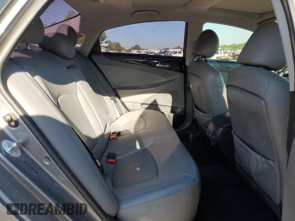 2012 Hyundai Sonata Limited z VIN 5NPEC4AC1CH313935, wystawiony jako Copart lot #56330475 z przebiegiem 202 739 mil mil oraz Szkoda całkowita • Salvage title. Historia ofert i sprzedaży dostępna na DreamBid. Obrazek 10.