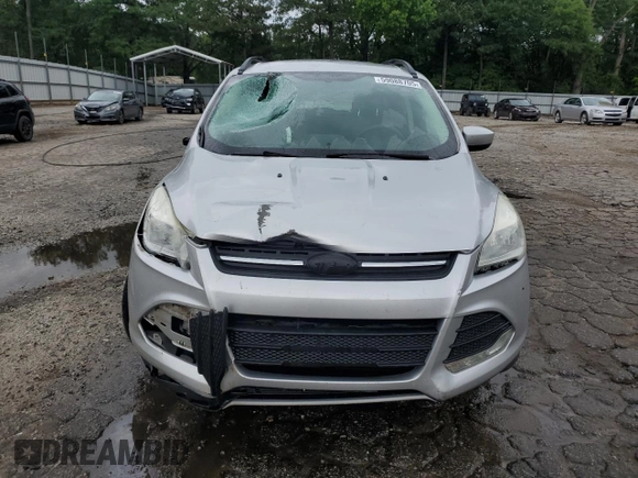 2013 Ford Escape SE with VIN 1FMCU0GX7DUA57262, listed as a Copart auction lot 59088705 with 157,201 mi miles and Salvage title. Bid and sale history available at DreamBid. Image 5.
