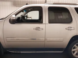 2014 GMC Yukon Denali with VIN 1GKS2EEF0ER134804, listed as a IAAI auction lot 41582709 with 142,192 mi miles. Bid and sale history available at carsss.com. Image 15.