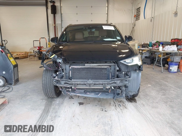 2021 Audi Q3 S line Premium Plus with VIN WA1EECF32M1054629, listed as a IAAI auction lot 41588322 with 33,385 mi miles and . Bid and sale history available at DreamBid. Image 13.