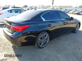 2014 Infiniti Q50 Hybrid Sport with VIN JN1AV7AR1EM701435, listed as a IAAI auction lot 41479140 with 154,338 mi miles. Bid and sale history available at carsss.com. Image 4.