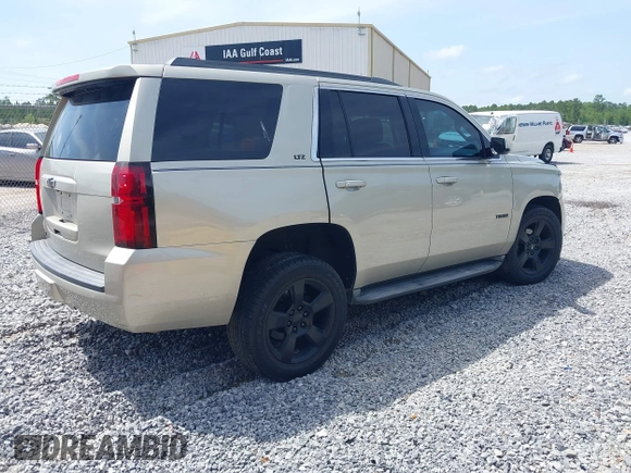 2015 Chevrolet Tahoe LT z VIN 1GNSCBKC7FR140125, wystawiony jako IAAI lot #42279760 z przebiegiem 201 335 mil mil oraz . Historia ofert i sprzedaży dostępna na DreamBid. Obrazek 4.