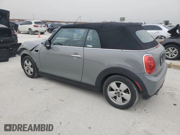 2019 MINI Convertible Cooper z VIN WMWWG5C51K3F79995, wystawiony jako Copart lot #48365685 z przebiegiem 74 357 mil mil oraz Szkoda całkowita • Salvage title. Historia ofert i sprzedaży dostępna na DreamBid. Obrazek 2.