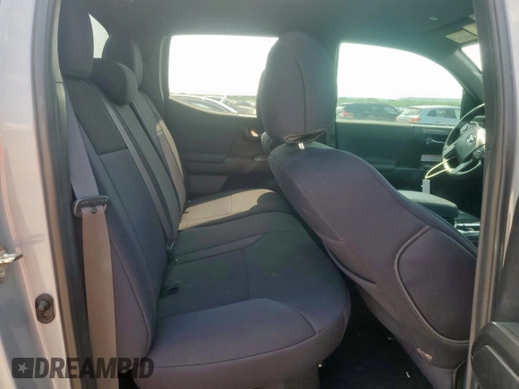 2019 Toyota Tacoma SR z VIN 5TFCZ5AN6KX211952, wystawiony jako Copart lot #58964815 z przebiegiem 97 774 mil mil oraz Szkoda całkowita • Salvage title. Historia ofert i sprzedaży dostępna na DreamBid. Obrazek 10.
