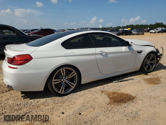 2014 BMW M6 z VIN WBSLX9C53ED160497, wystawiony jako Copart lot #62826444 z przebiegiem 55 639 mil mil oraz Szkoda całkowita • Salvage title. Historia ofert i sprzedaży dostępna na DreamBid. Obrazek 3.
