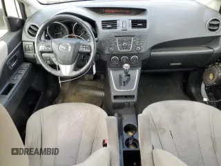 2012 Mazda 5 Touring z VIN JM1CW2CL0C0123721, wystawiony jako Copart lot #52415065 z przebiegiem 168 659 mil mil oraz Szkoda całkowita • Salvage title. Historia ofert i sprzedaży dostępna na DreamBid. Obrazek 8.