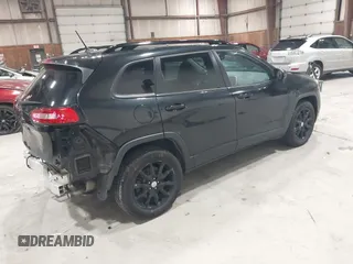 2014 Jeep Cherokee Latitude with VIN 1C4PJMCS6EW299532, listed as a IAAI auction lot 41833888 with 199,915 mi miles and . Bid and sale history available at DreamBid. Image 4.