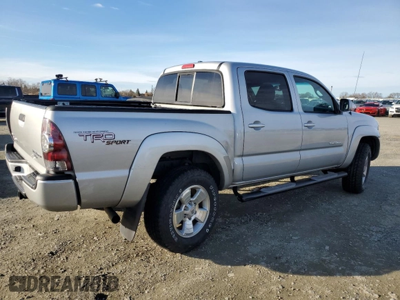 2011 Toyota Tacoma PreRunner with VIN 3TMJU4GN7BM114871, listed as a Copart auction lot 87256214 with 214,236 mi miles and Salvage Title. Bid and sale history available at DreamBid. Image 3.