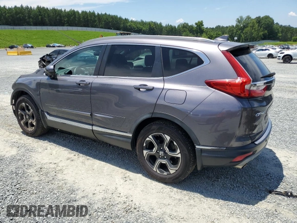 2018 Honda CR-V Touring with VIN 7FARW2H99JE013003, listed as a Copart auction lot 63364805 with 40,051 mi miles and Salvage title. Bid and sale history available at DreamBid. Image 2.