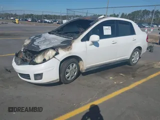 2008 Nissan Versa 1.8 S with VIN 3N1BC11E58L441687, listed as a IAAI auction lot 41900596 with 1 mi miles. Bid and sale history available at carsss.com. Image 2.