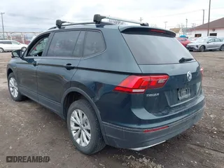 2019 Volkswagen Tiguan S with VIN 3VV0B7AX8KM178139, listed as a IAAI auction lot 41860225 with 97,980 mi miles. Bid and sale history available at carsss.com. Image 3.