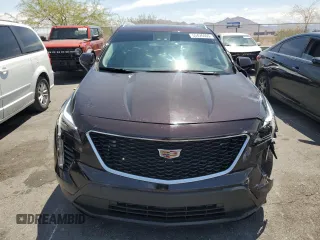2020 Cadillac XT4 FWD Luxury z VIN 1GYAZAR40LF059910, wystawiony jako Copart lot #55426065 z przebiegiem 36 590 mil mil oraz Szkody całkowita. Historia ofert i sprzedaży dostępna na DreamBid. Obrazek 5.
