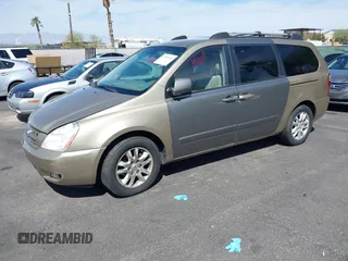 2006 Kia Sedona LX with VIN KNDMB233X66069684, listed as a IAAI auction lot 41997424 with 191,982 mi miles. Bid and sale history available at carsss.com. Image 2.