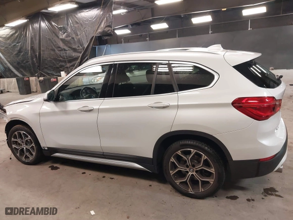 2021 BMW X1 xDrive28i with VIN WBXJG9C0XM5T76975, listed as a IAAI auction lot 41310115 with 26,869 mi miles. Bid and sale history available at carsss.com. Image 15.