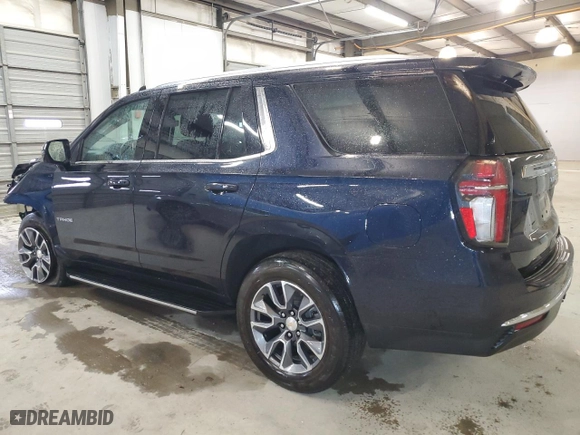 2023 Chevrolet Tahoe LT with VIN 1GNSCNKD0PR380094, listed as a Copart auction lot 48987865 with 51,372 mi miles and Clean Title. Bid and sale history available at carsss.com. Image 2.