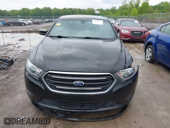 2015 Ford Taurus SEL z VIN 1FAHP2E86FG172631, wystawiony jako IAAI lot #42307630 z przebiegiem 95 184 mil mil oraz . Historia ofert i sprzedaży dostępna na DreamBid. Obrazek 13.