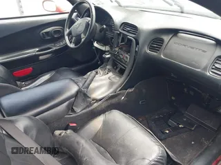 2000 Chevrolet Corvette z VIN 1G1YY22G9Y5121554, wystawiony jako IAAI lot #42437146 z przebiegiem Nie podano mil oraz . Historia ofert i sprzedaży dostępna na DreamBid. Obrazek 5.