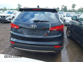 2016 Hyundai Santa Fe z VIN 5XYZU3LB2GG316241, wystawiony jako IAAI lot #42636996 z przebiegiem 256 253 mil mil oraz . Historia ofert i sprzedaży dostępna na DreamBid. Obrazek 16.