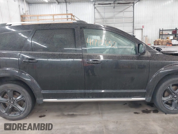 2020 Dodge Journey Crossroad with VIN 3C4PDCGB4LT263188, listed as a IAAI auction lot 41712652 with 92,639 mi miles and . Bid and sale history available at carsss.com. Image 14.