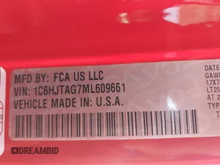 2021 Jeep Gladiator Freedom z VIN 1C6HJTAG7ML609661, wystawiony jako IAAI lot #41410756 z przebiegiem 44 636 mil mil oraz . Historia ofert i sprzedaży dostępna na DreamBid. Obrazek 9.