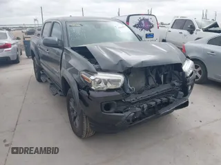 2023 Toyota Tacoma SR5 z VIN 3TMAZ5CN8PM201702, wystawiony jako IAAI lot #42060855 z przebiegiem 17 705 mil mil oraz . Historia ofert i sprzedaży dostępna na DreamBid. Obrazek 1.