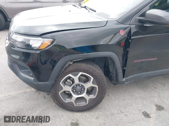 2022 Jeep Compass Trailhawk with VIN 3C4NJDDB8NT107992, listed as a IAAI auction lot 42116531 with 48,787 mi miles and . Bid and sale history available at DreamBid. Image 6.