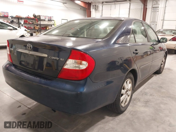 2003 Toyota Camry LE with VIN 4T1BE30K03U152348, listed as a IAAI auction lot 42082892 with 224,721 mi miles and . Bid and sale history available at DreamBid. Image 4.
