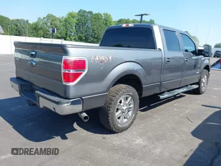 2013 Ford F-150 XL with VIN 1FTFW1ET5DFD42810, listed as a IAAI auction lot 42681301 with 154,021 mi miles and . Bid and sale history available at DreamBid. Image 4.