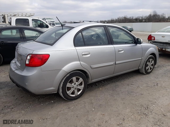 2010 Kia Rio LX with VIN KNADH4A35A6687434, listed as a Copart auction lot 85706054 with 139,237 mi miles and Salvage Title. Bid and sale history available at carsss.com. Image 3.