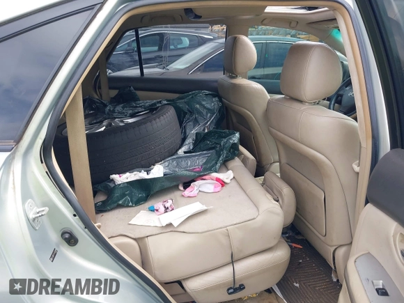 2006 Lexus RX 400h with VIN JTJHW31U260024648, listed as a IAAI auction lot 42632917 with 246,808 mi miles and . Bid and sale history available at DreamBid. Image 8.