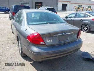 2003 Ford Taurus SE Standard with VIN 1FAFP53U93G221714, listed as a IAAI auction lot 42636704 with 150,804 mi miles and . Bid and sale history available at DreamBid. Image 16.