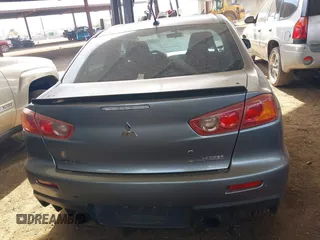 2014 Mitsubishi Lancer Evolution GSR with VIN JA32W8FV3EU008262, listed as a IAAI auction lot 41653902 with 128,977 mi miles. Bid and sale history available at carsss.com. Image 16.