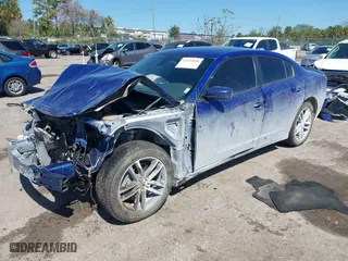 2019 Dodge Charger SXT with VIN 2C3CDXJG6KH675862, listed as a IAAI auction lot 41693890 with 107,092 mi miles. Bid and sale history available at carsss.com. Image 17.