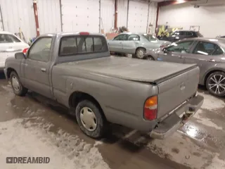1998 Toyota Tacoma with VIN 4TANL42N3WZ133137, listed as a IAAI auction lot 41319090 with 246,878 mi miles. Bid and sale history available at carsss.com. Image 3.
