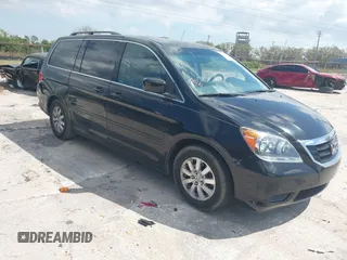 2010 Honda Odyssey EX-L with VIN 5FNRL3H79AB028724, listed as a IAAI auction lot 41687998 with 221,852 mi miles. Bid and sale history available at carsss.com. Image 1.