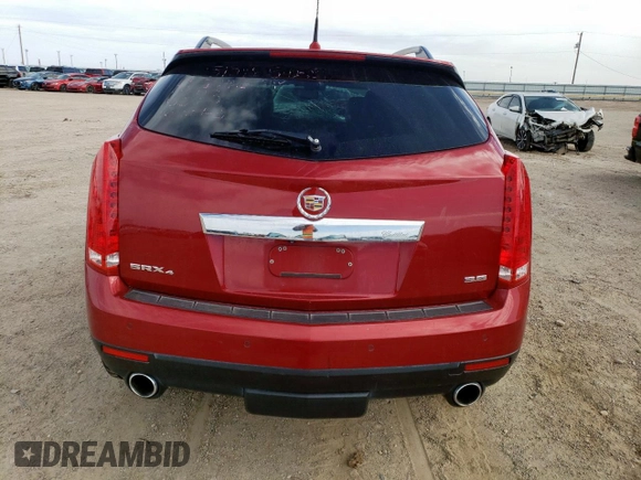 2014 Cadillac SRX Premium Collection with VIN 3GYFNGE39ES546393, listed as a Copart auction lot 57261145 with 84,258 mi miles and Salvage title. Bid and sale history available at DreamBid. Image 6.