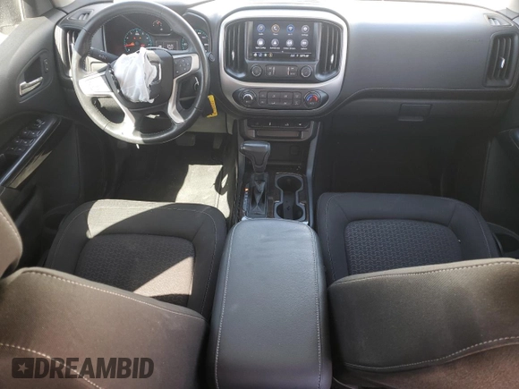 2021 GMC Canyon 2WD Elevation with VIN 1GTG5CENXM1293587, listed as a Copart auction lot 48582395 with 18,708 mi miles and Salvage title. Bid and sale history available at DreamBid. Image 8.