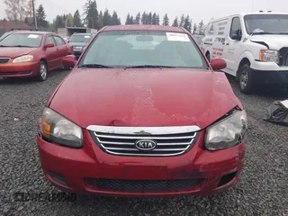 2009 Kia Spectra EX with VIN KNAFE222695621925, listed as a IAAI auction lot 40657622 with 135,647 mi miles. Bid and sale history available at carsss.com. Image 12.
