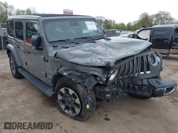 2022 Jeep Wrangler Unlimited Sahara with VIN 1C4HJXEG7NW138105, listed as a IAAI auction lot 42146898 with Not provided miles and . Bid and sale history available at DreamBid. Image 6.