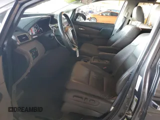 2014 Honda Odyssey Touring with VIN 5FNRL5H99EB111525, listed as a Copart auction lot 61986005 with 137,905 mi miles and Salvage title. Bid and sale history available at DreamBid. Image 7.