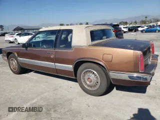 1988 Cadillac Eldorado z VIN 1G6EL115XJU611177, wystawiony jako Copart lot #46526855 z przebiegiem 122 780 mil mil oraz Szkody całkowita. Historia ofert i sprzedaży dostępna na DreamBid. Obrazek 2.